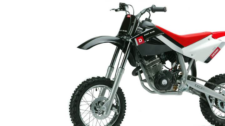 Derbi Dirt Kid 100 In Red And White Side Pose And White Bsckground